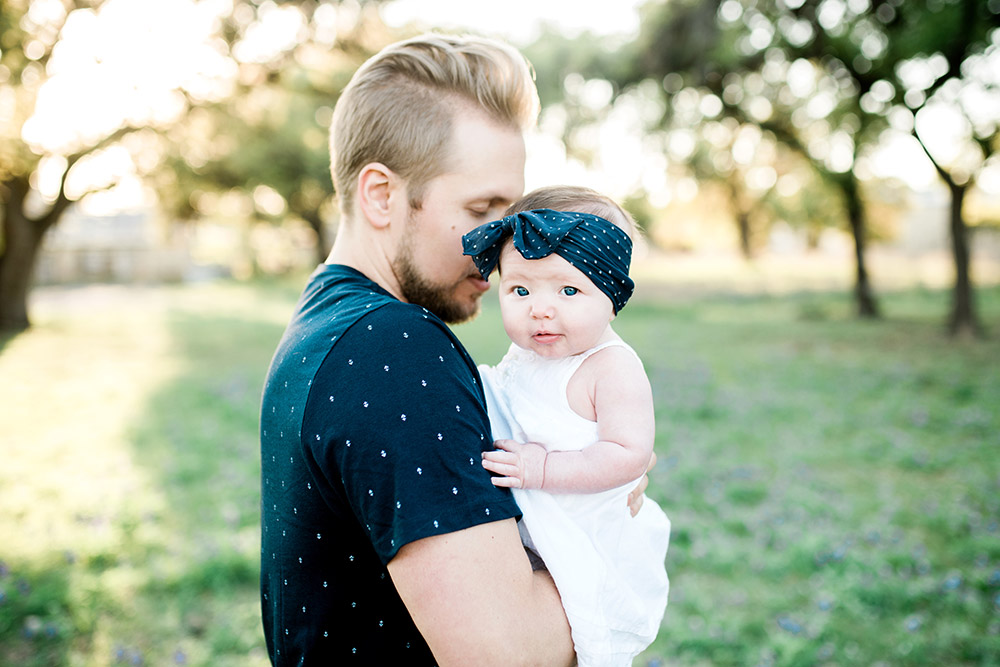 dad holding baby in san antonio texas