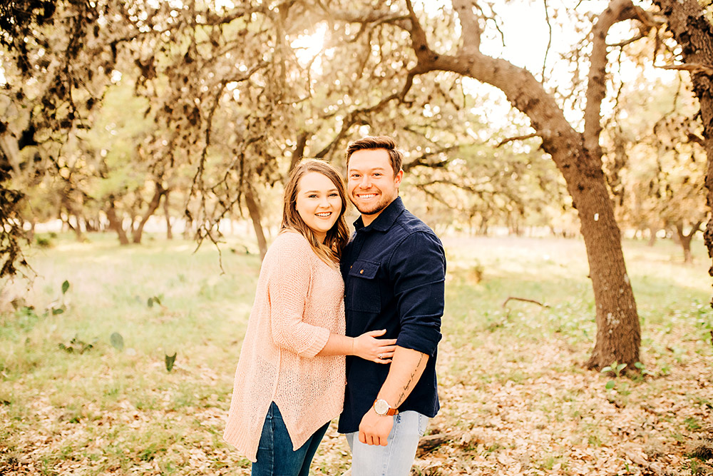 couple smiling in texas hill country