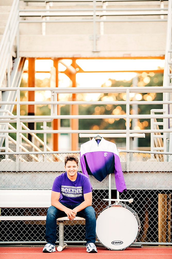 teen boy sitting on bench in san antonio texas