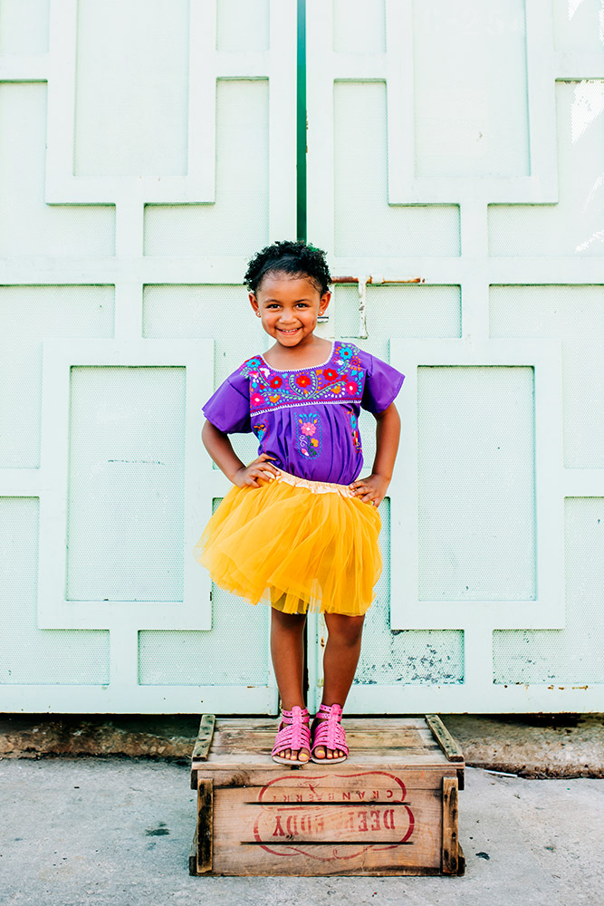 little girl standing on box in san antonio texas
