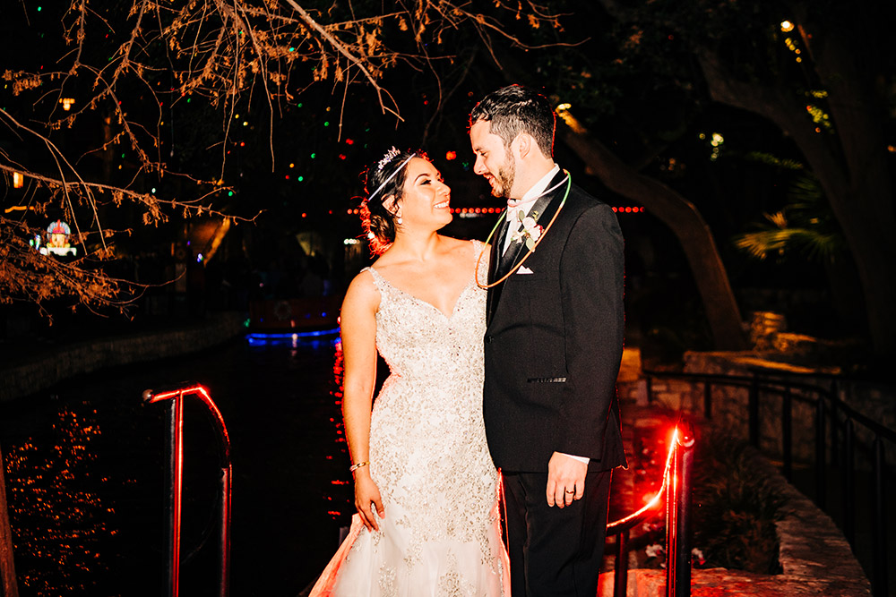 bride and groom smiling at each other in san antonio texas