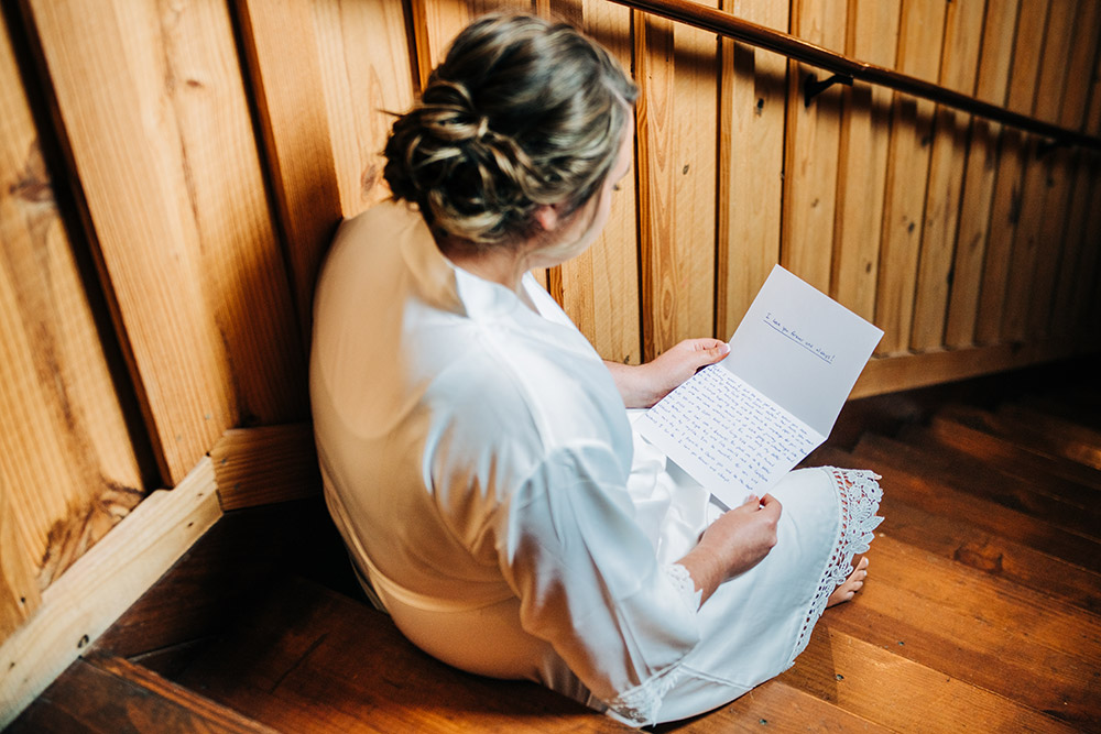 bride reading letter in texas hill country