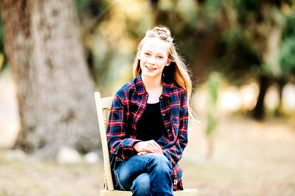 teen girl sitting on chair in san antonio texas